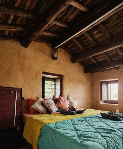 Pahadi House rustic bedroom with mountain charm