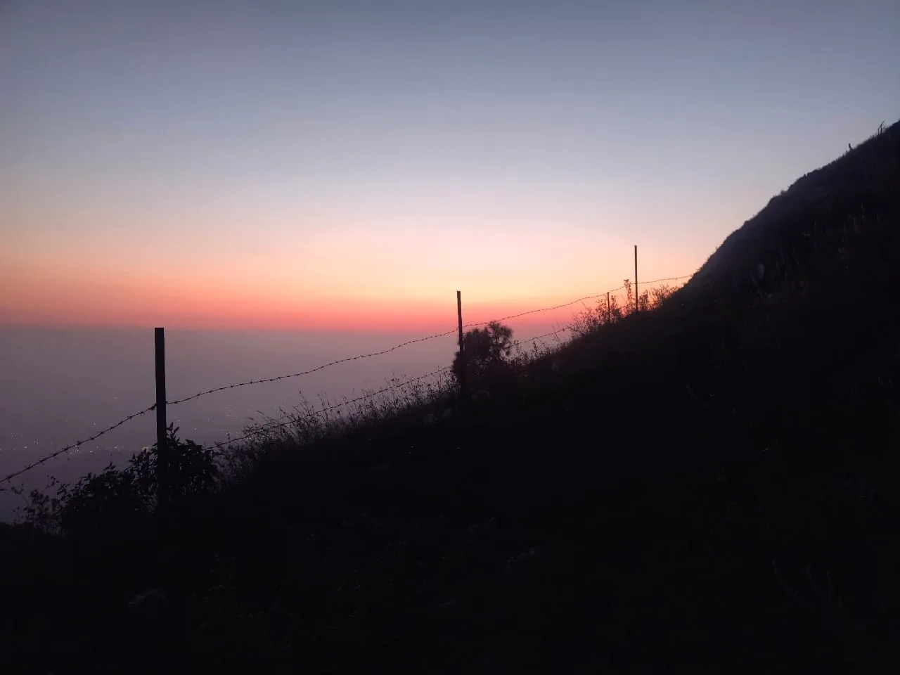 Dusk fence silhouette