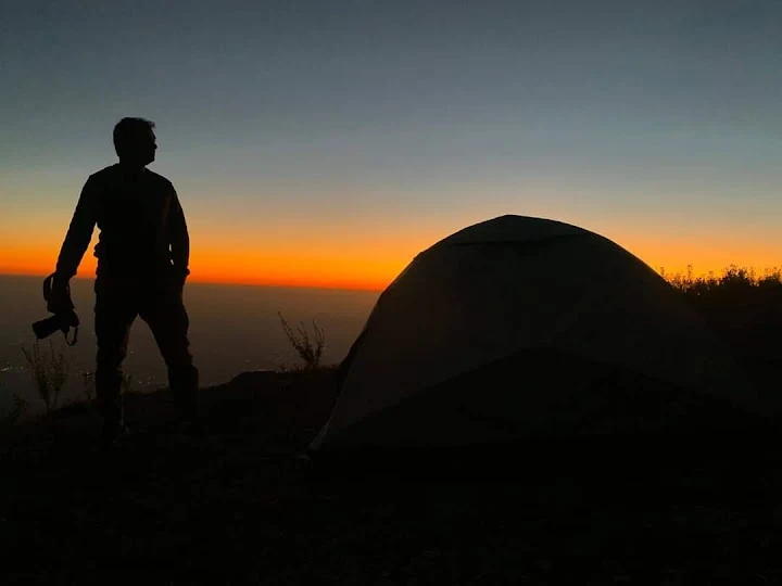 Tent silhouette at sunset