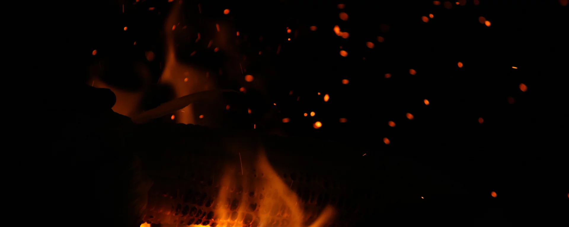 Guests gathered warmly around the crackling bonfire