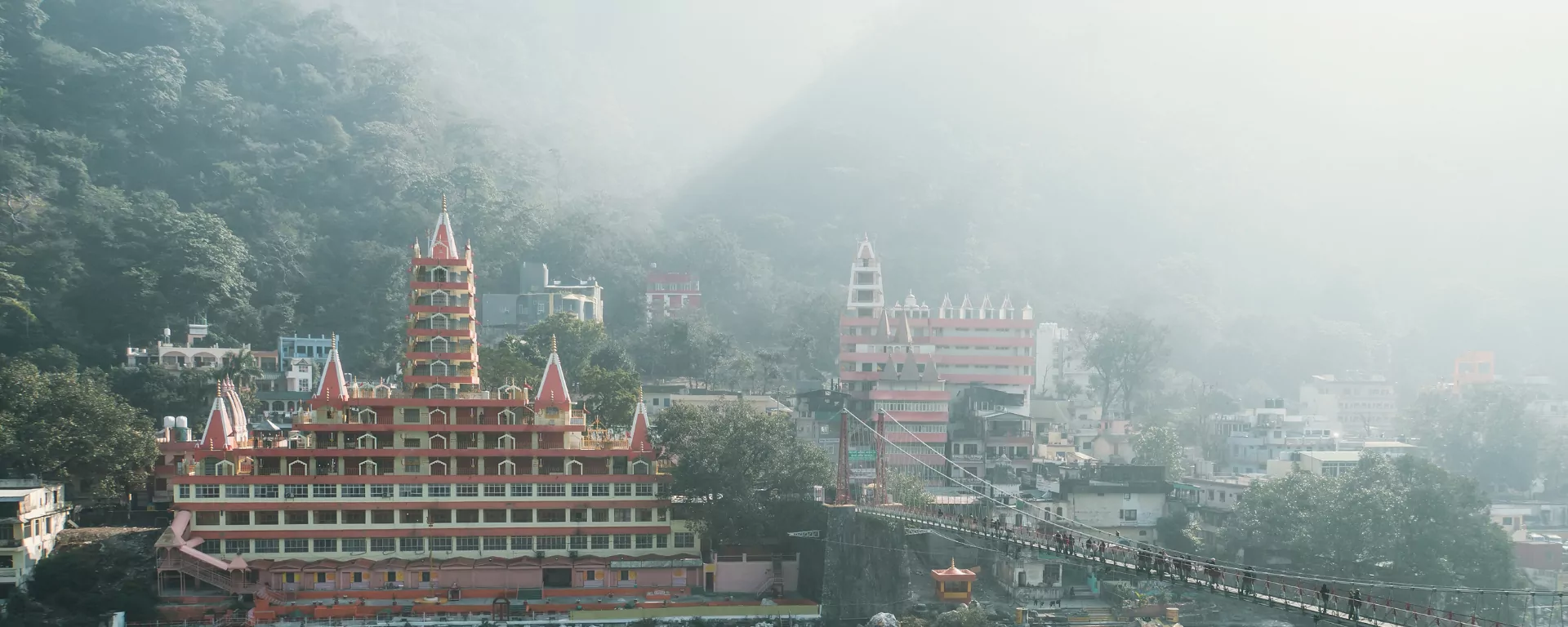 Hiker pausing on the ridge to watch the sun rise