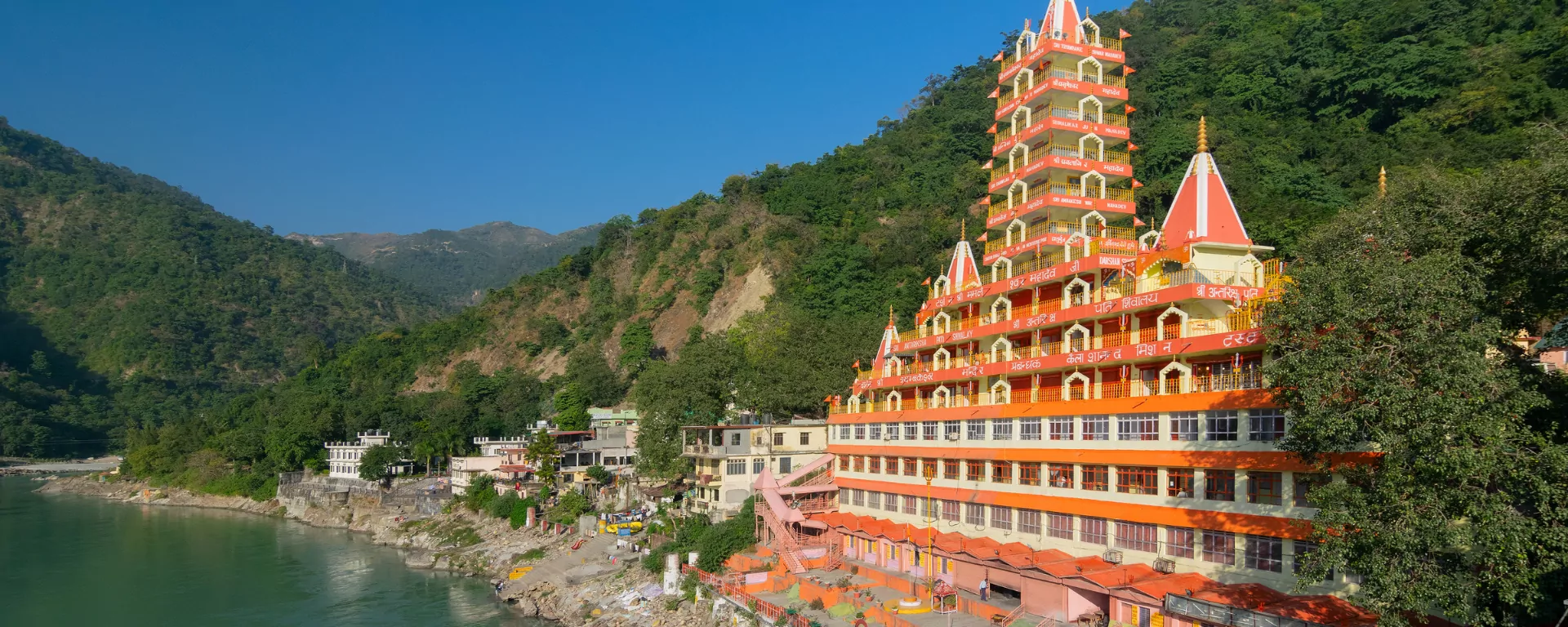 Misty valleys revealed as the sun climbs