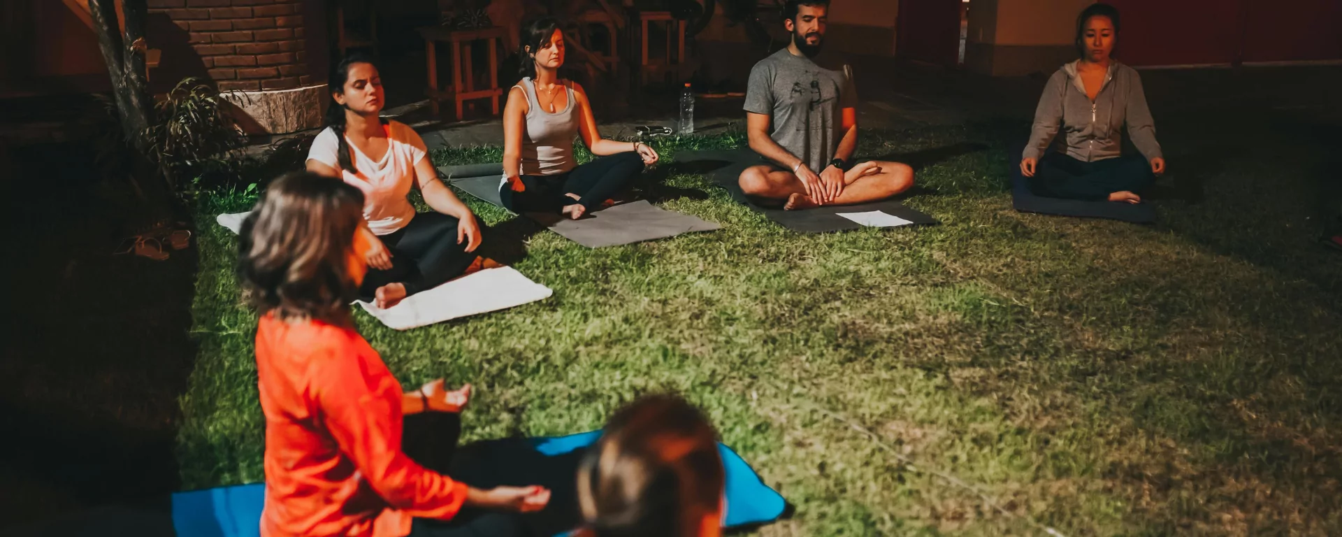 Asana practice on the wooden deck at dawn