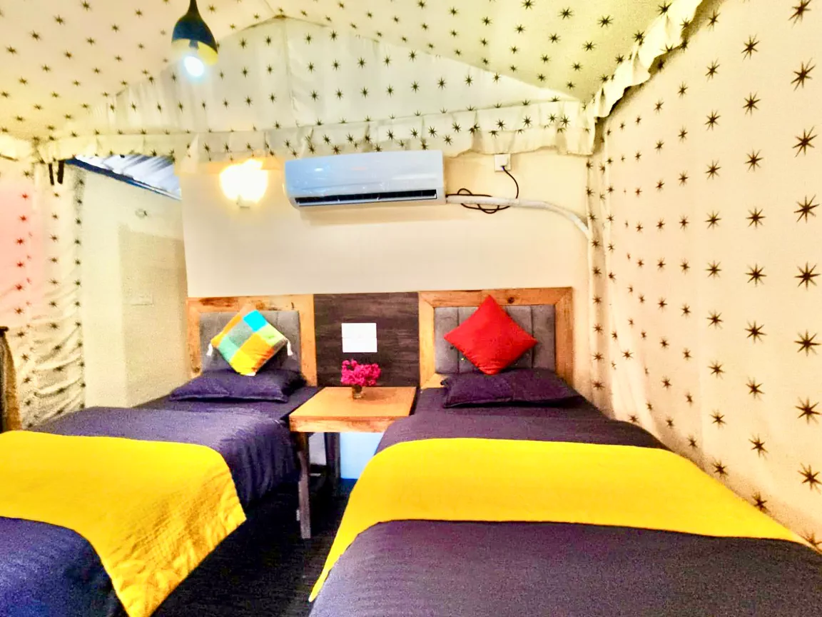 Air-conditioned twin-bed cottage interior