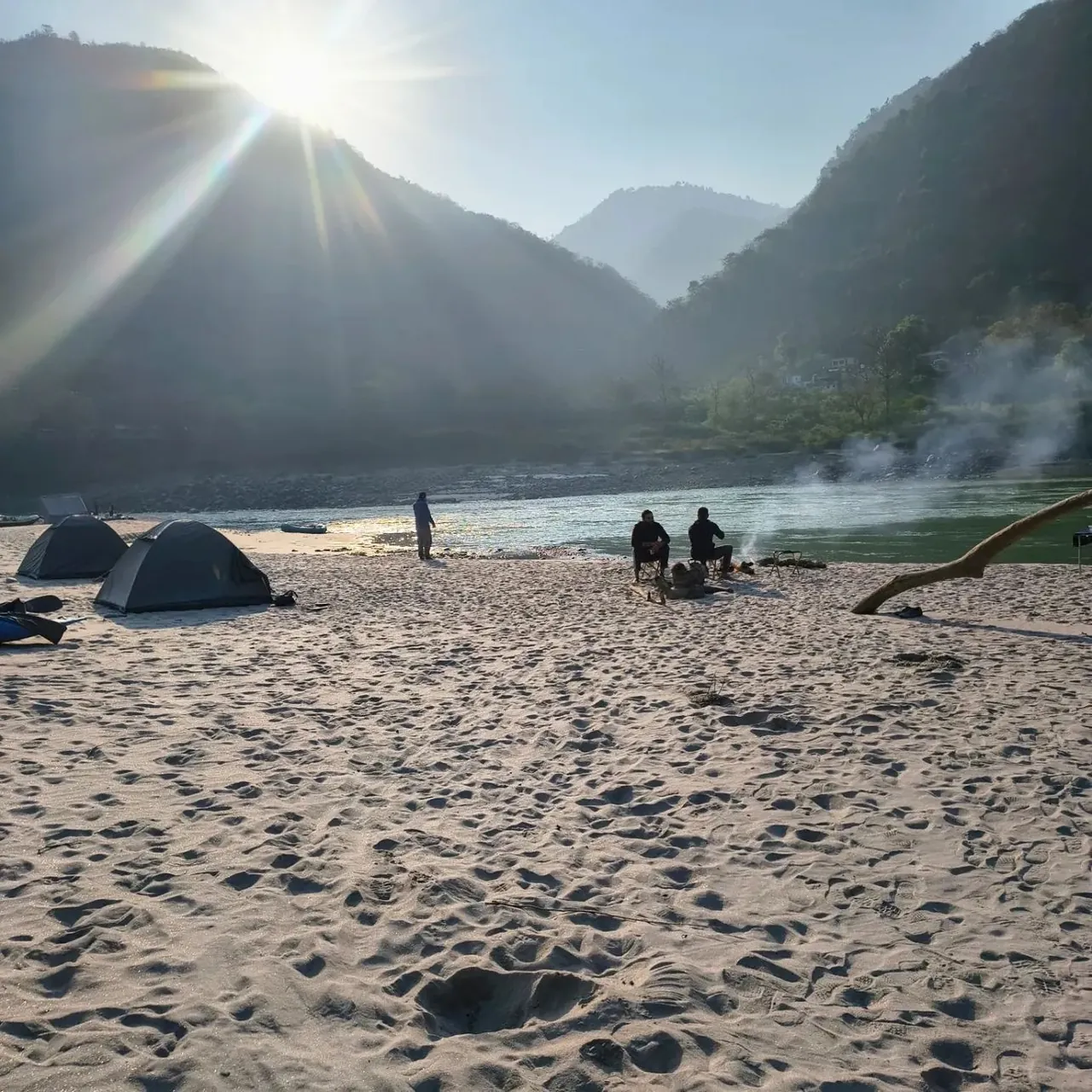 Riverside beach camping by the Ganga at sunrise near Rishikesh