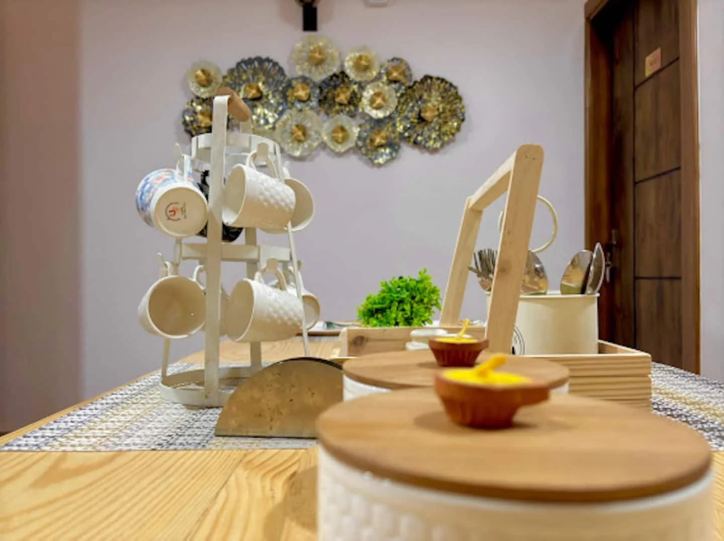 Crockery and kitchen basics laid out at Prembasant Homestay, Rishikesh