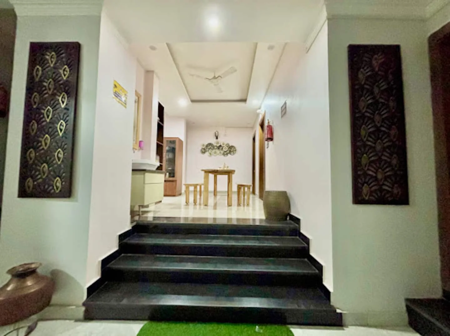 Interior staircase and hallway at Prembasant Homestay