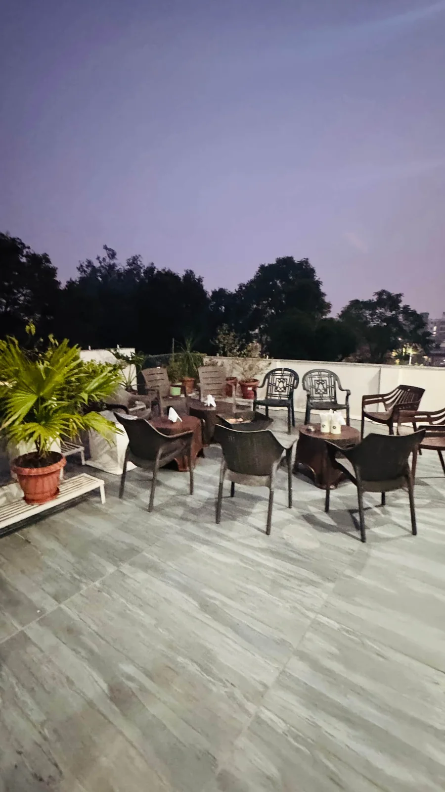 Rooftop terrace at dusk at Prembasant Homestay, Rishikesh