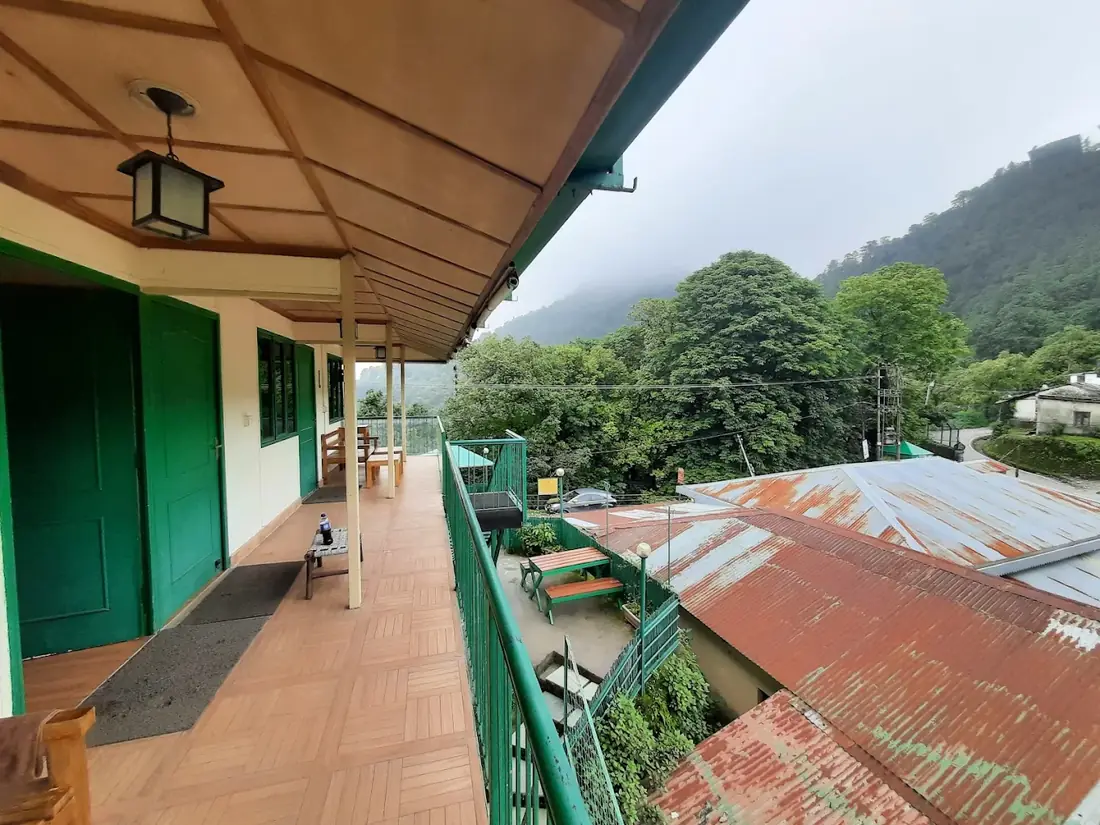 Covered veranda with a valley view at Seegreen Rooftop Cafe and Homestay, Mussoorie