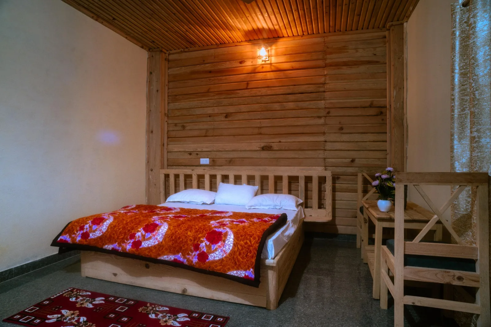 Pine panelled bedroom at Aa Maa's Homestay, Pangrari, Mukteshwar