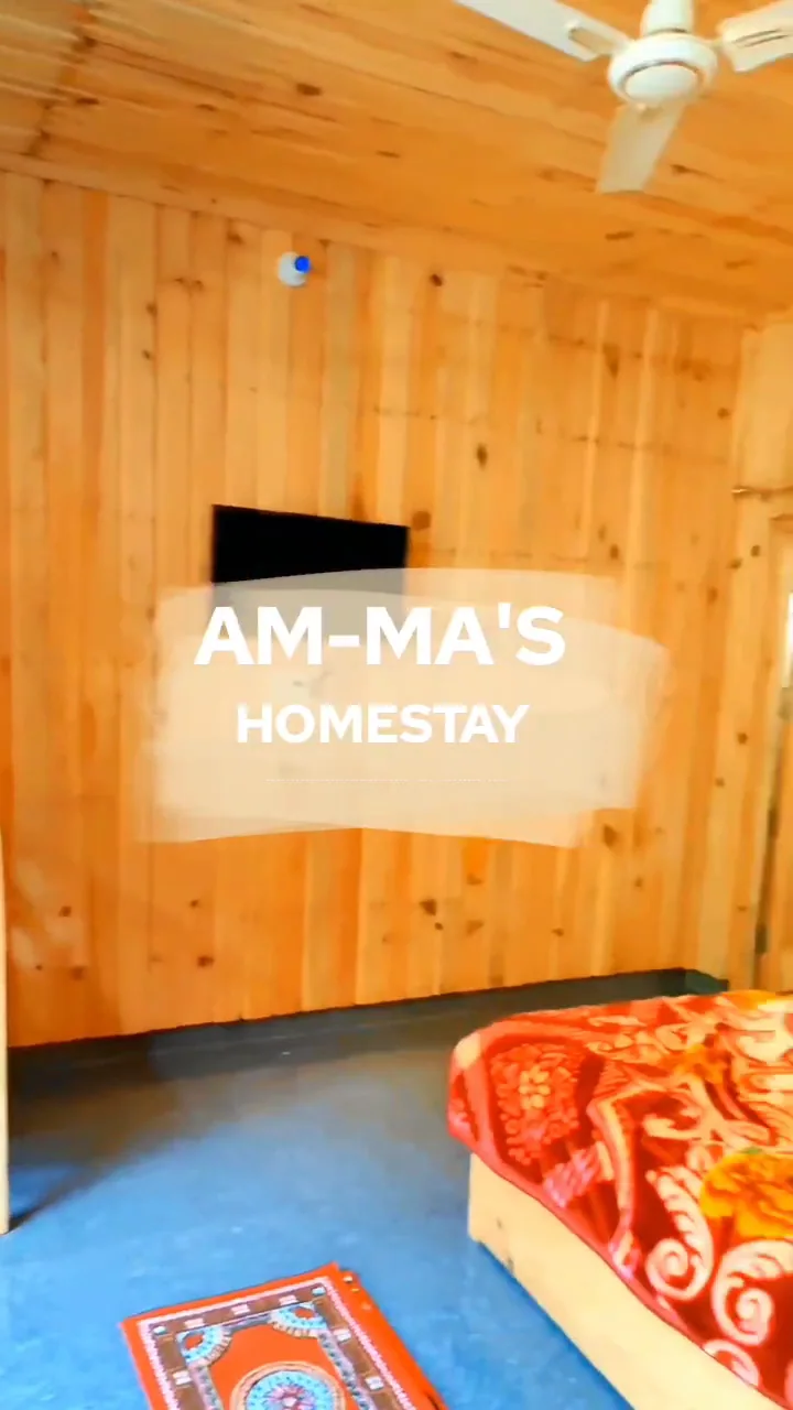 Room with the homestay name on the wall at Aa Maa's Homestay, Mukteshwar