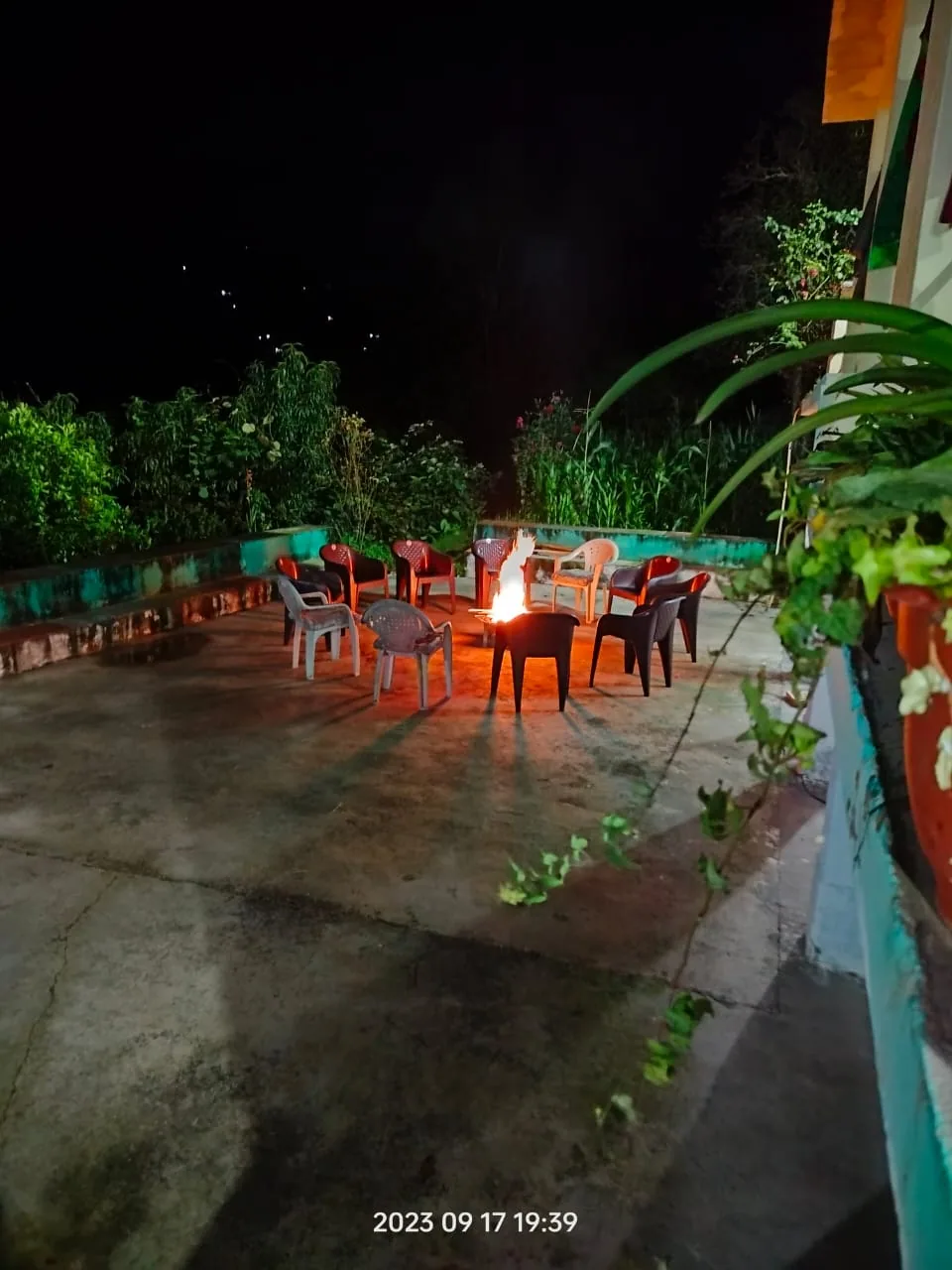 Bonfire and seating in the garden at Aa Maa's Homestay, Mukteshwar
