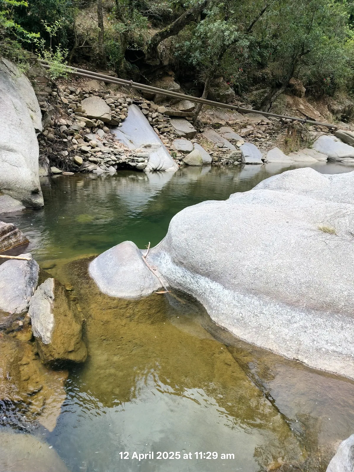 River and rocks near Aa Maa's Homestay at Pangrari, Mukteshwar