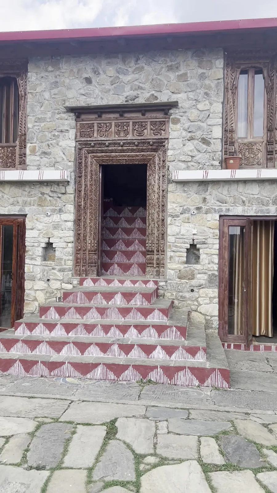 Steps and stone paving at the entrance to Basa Stay, Khirsu