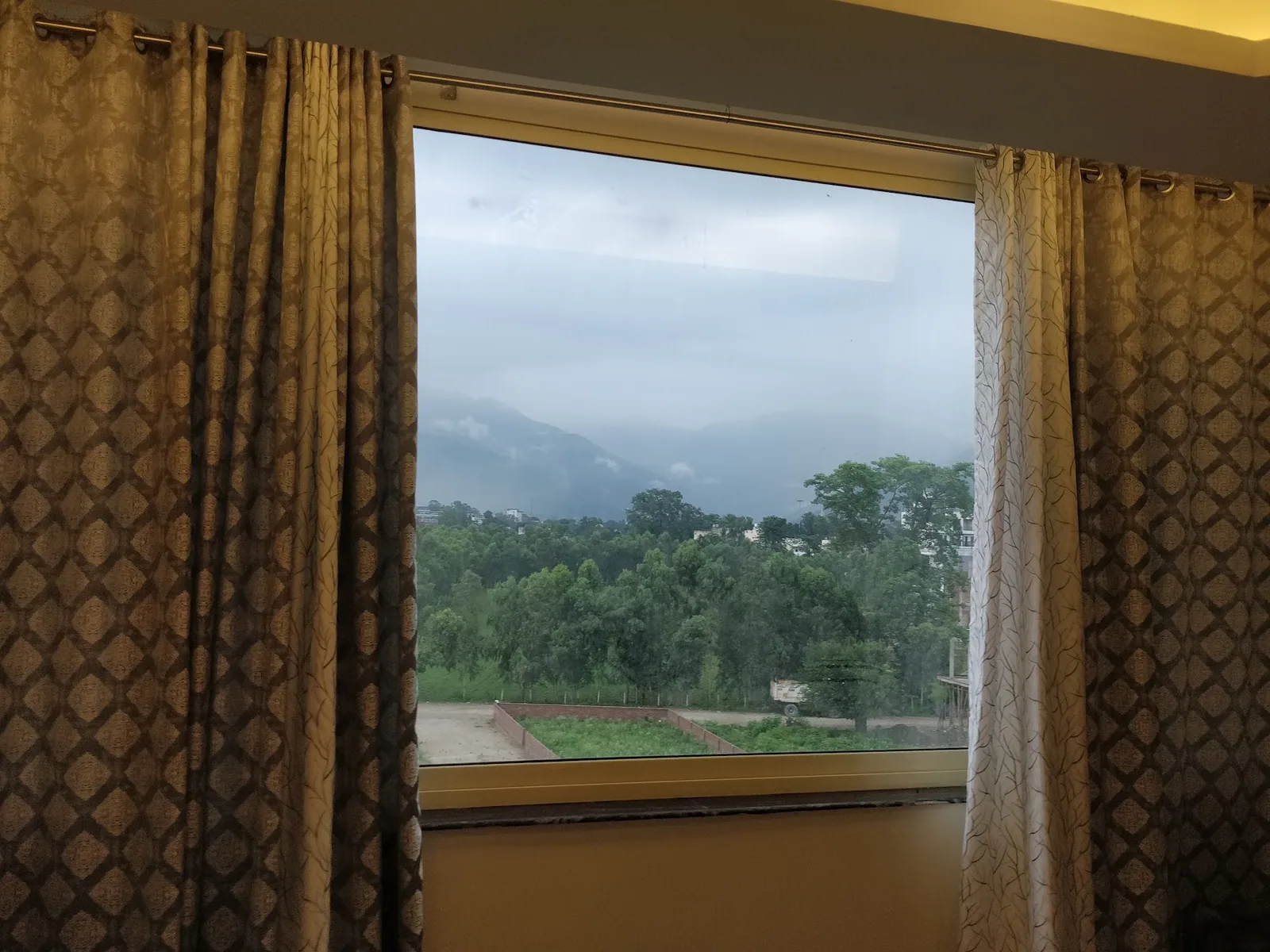 Window and hill view from the room, Little Sparrow Homestay, Rishikesh