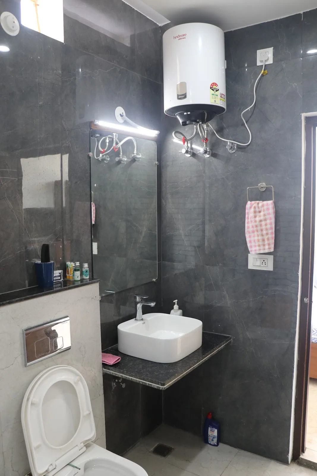 Bathroom with a geyser at Little Sparrow Homestay, Rishikesh