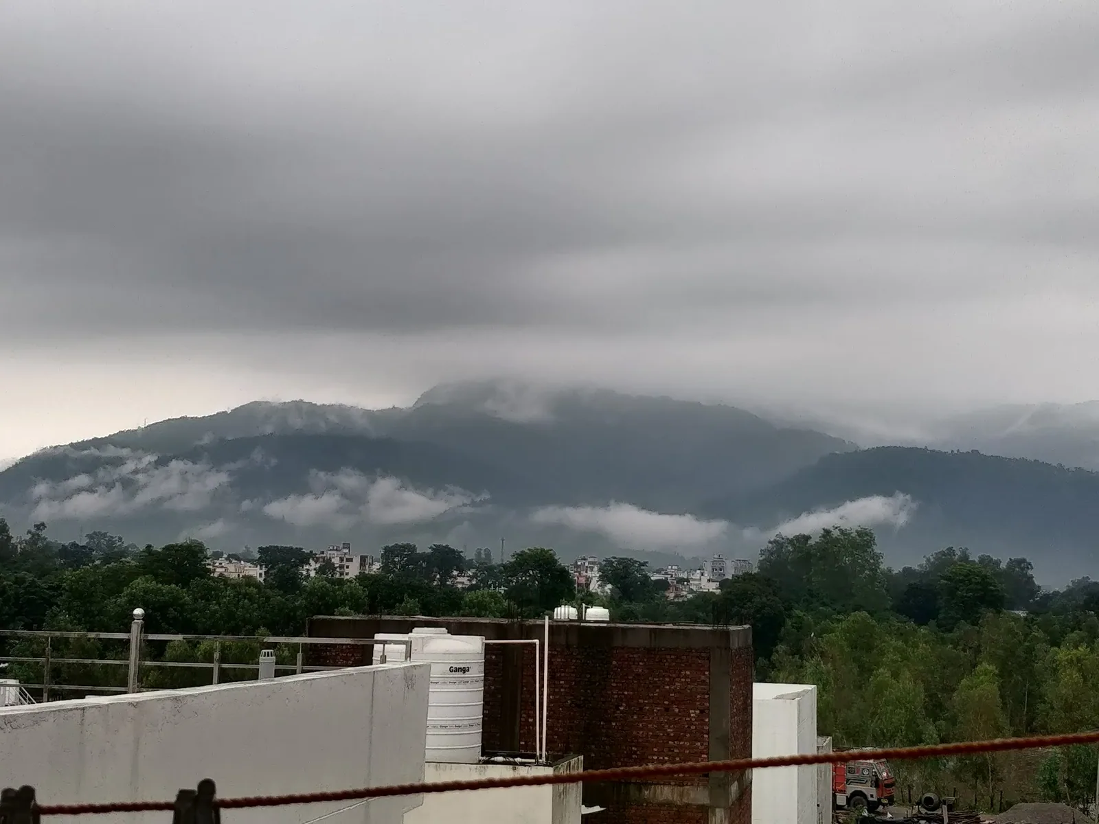 Clouds over the mountains from the terrace at Little Sparrow Homestay, Rishikesh
