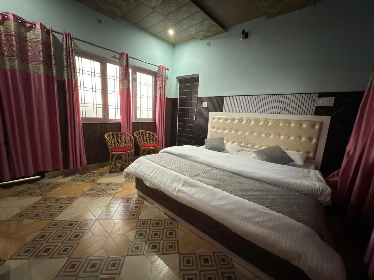 Valley-facing double room at Pahadi House Kanatal