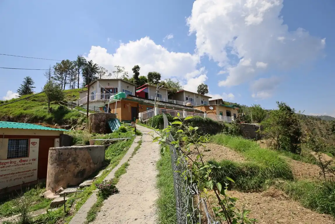Pahadi Ghar seen from the hillside path in Chaukhal village
