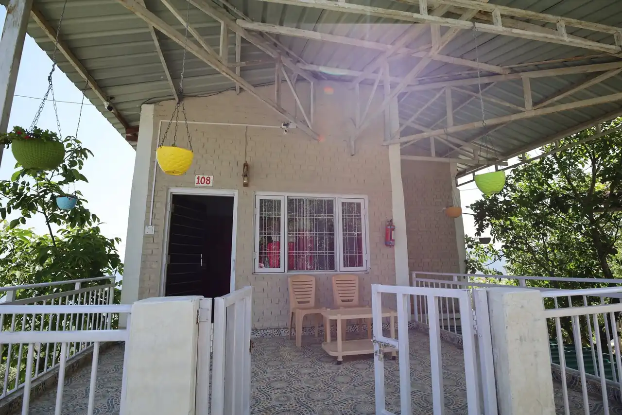 Private verandah outside a cottage at Pahadi House Kanatal