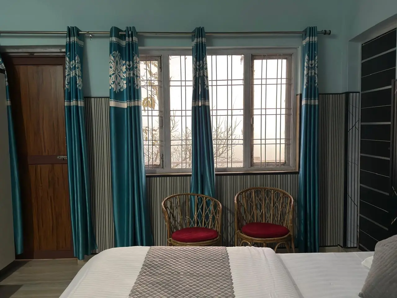 Super Deluxe room with extra bed at Pahadi House Kanatal, sleeps three