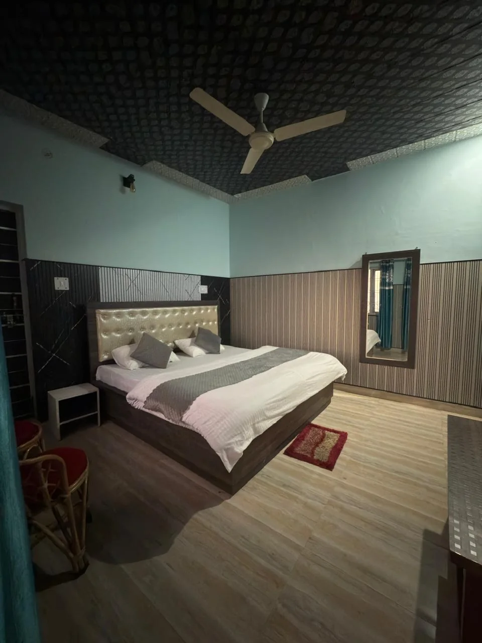 Deluxe room with wooden flooring at Pahadi House Kanatal