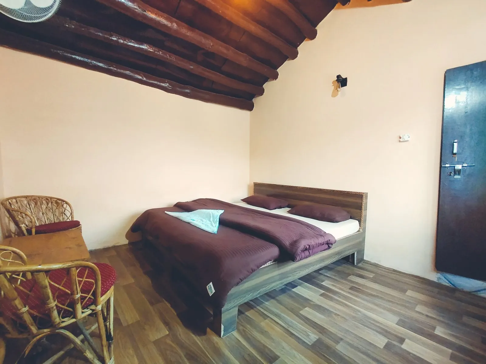 Simple room built with mud, cow-dung and wood walls