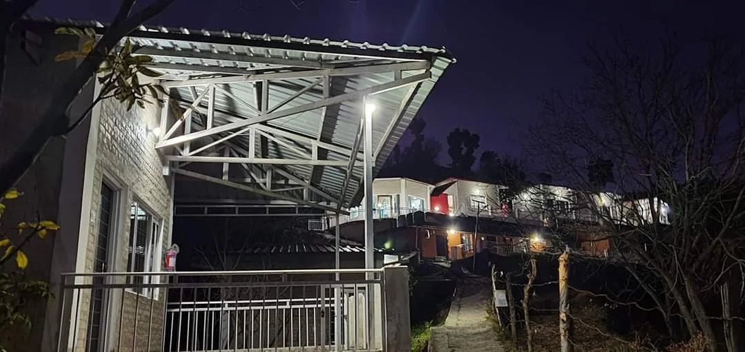 Verandah lights at night at Pahadi Ghar Kanatal