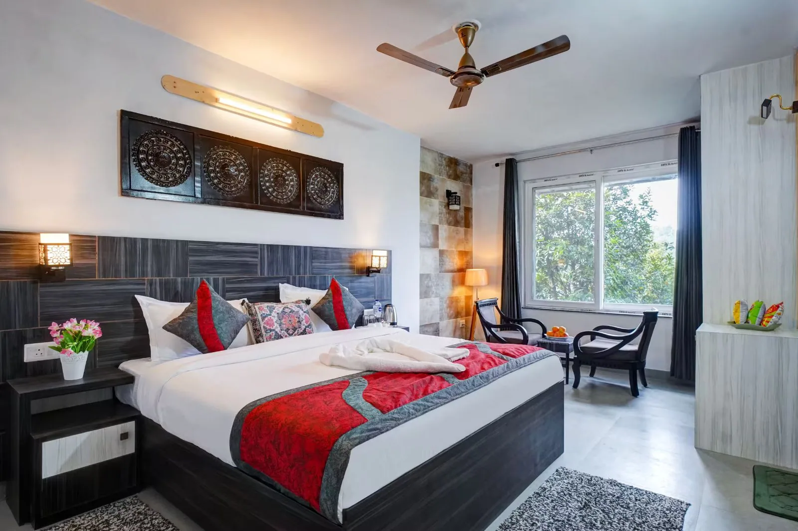 Second bedroom with a valley facing window at WindyRidge, Mukteshwar