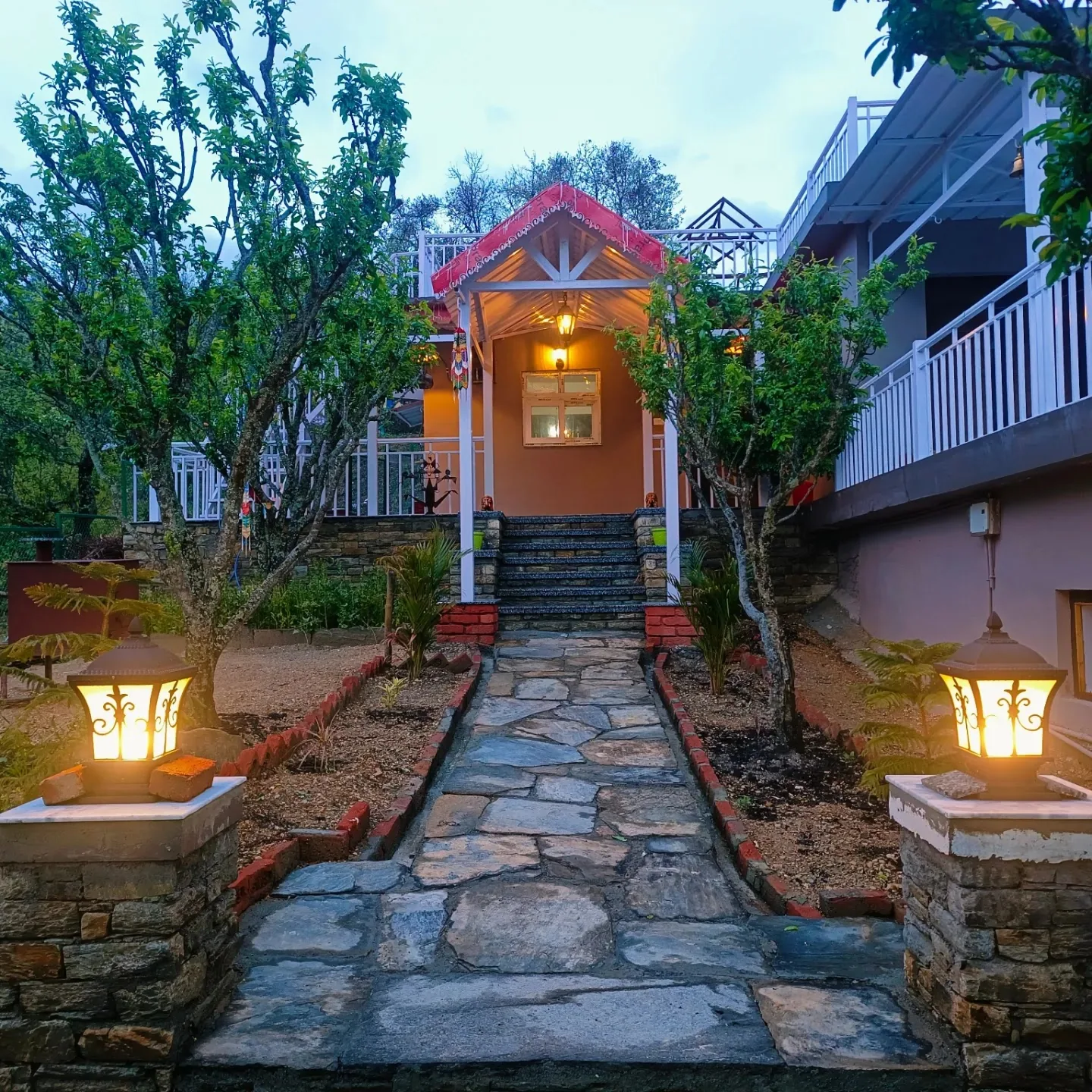 Lantern lit entrance steps at WindyRidge Plum Orchard Villa, Mukteshwar